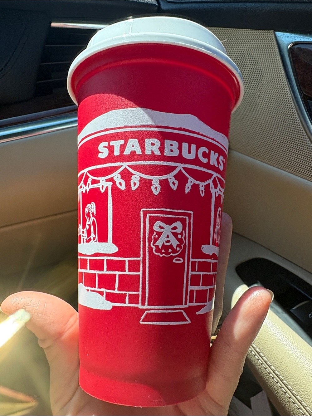Starbucks Red Holiday Cup with White Festive Illustration